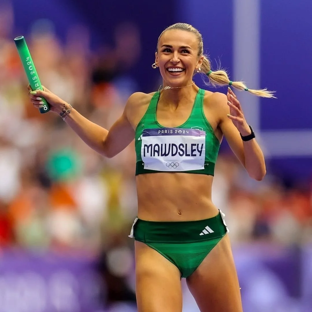 Sharlene Mawdsley in a contextual photograph: Sharlene Mawdsley celebrating a relay leg; contextual photograph, not tattoo evidence; not tattoo evidence