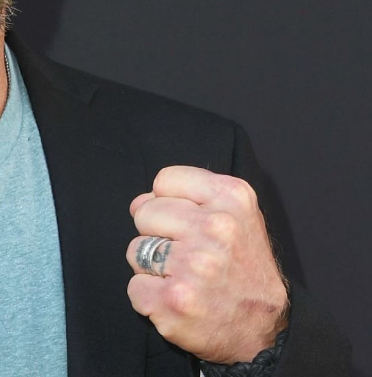 Shawn Michaels ring finger wedding band tattoo detail