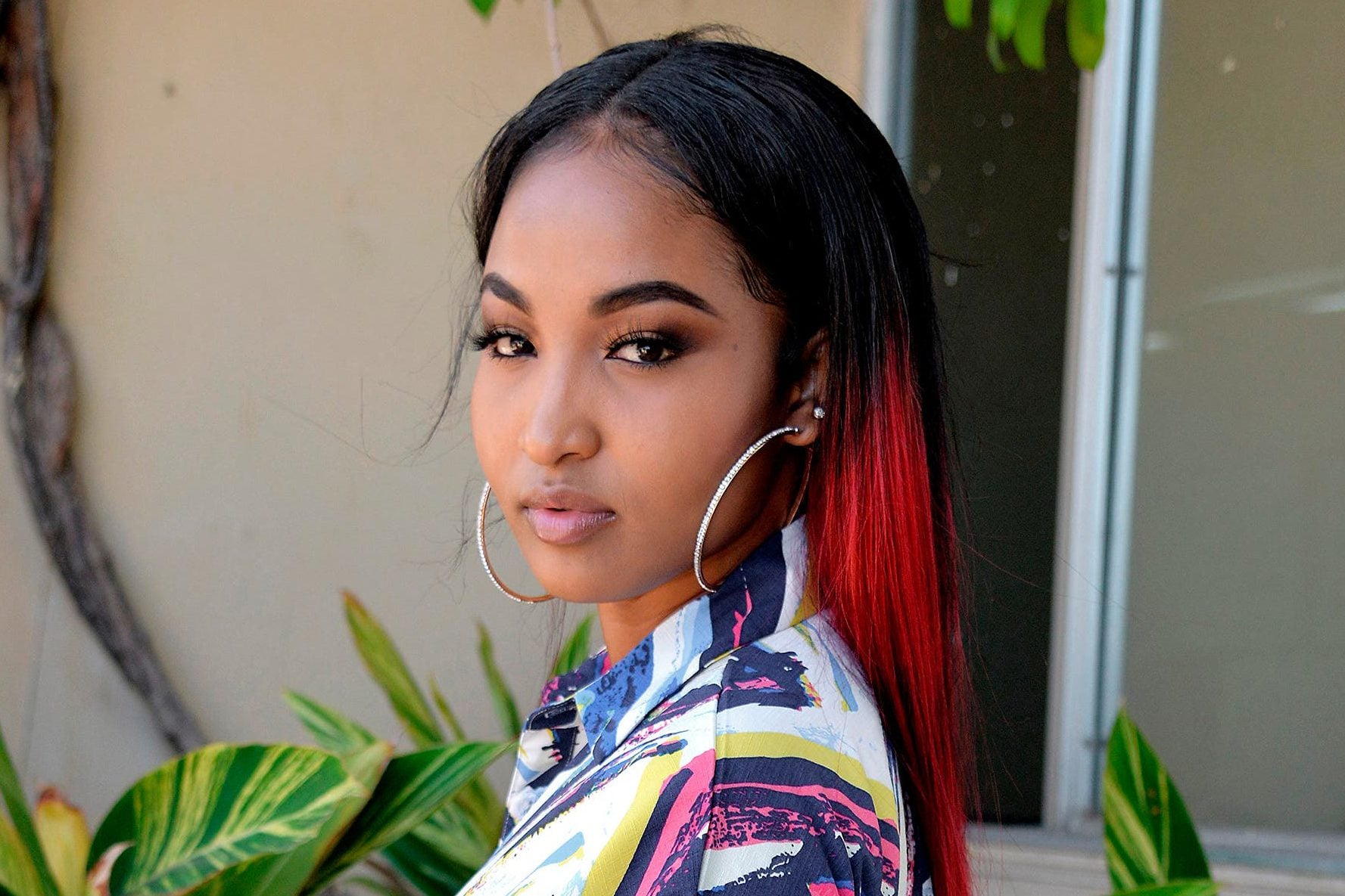 Shenseea portrait contextual image Shenseea in a contextual photograph: Shenseea style portrait contextual image, not tattoo evidence; not tattoo evidence