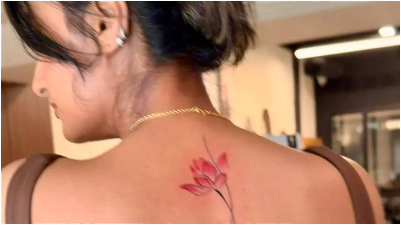 Shiwani Chakraborty tattoos: pink lotus tattoo section