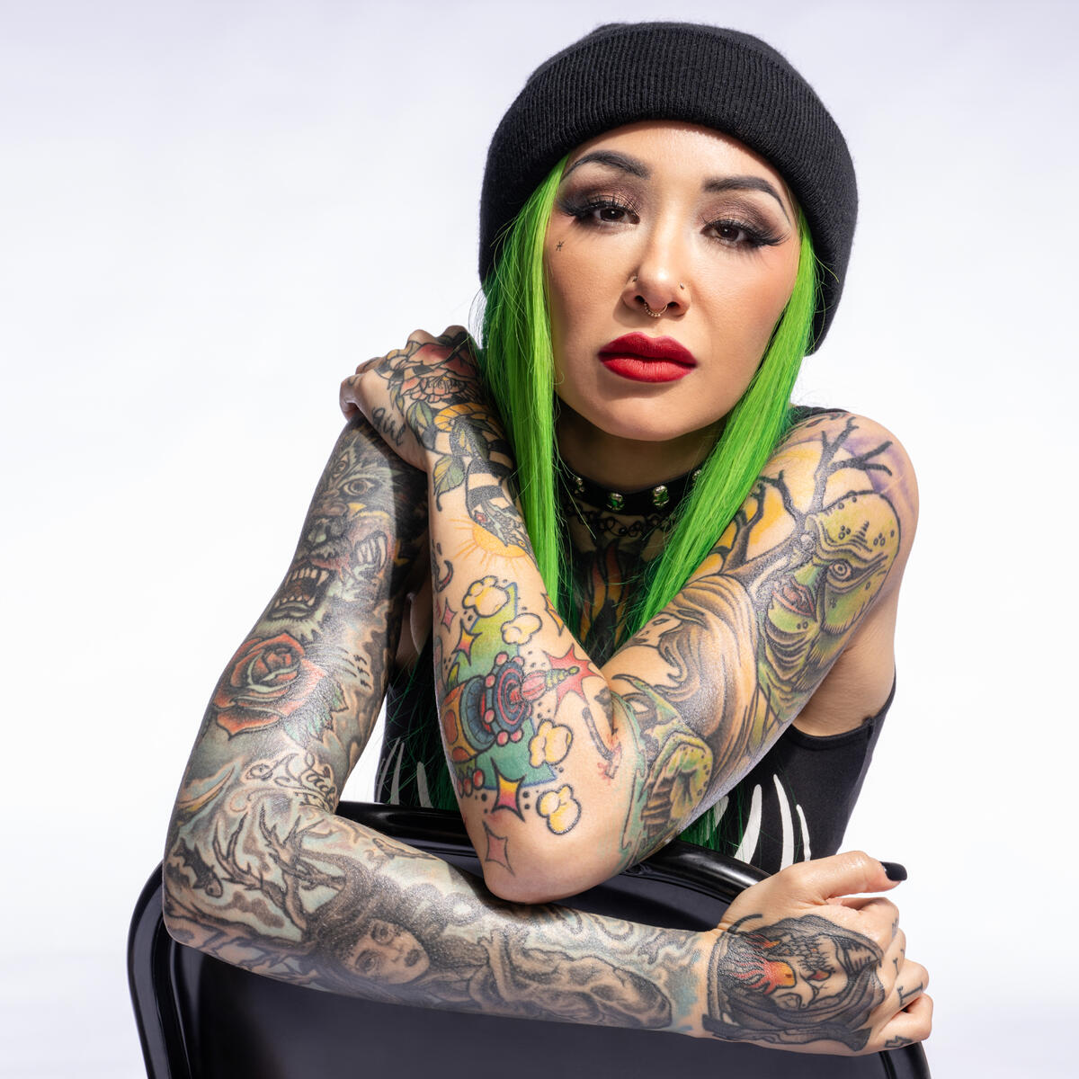 Shotzi colorful arm tattoos