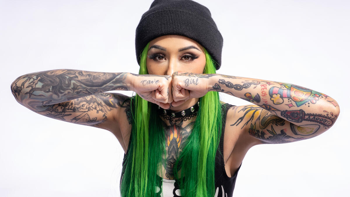 Shotzi forearm and hand tattoos