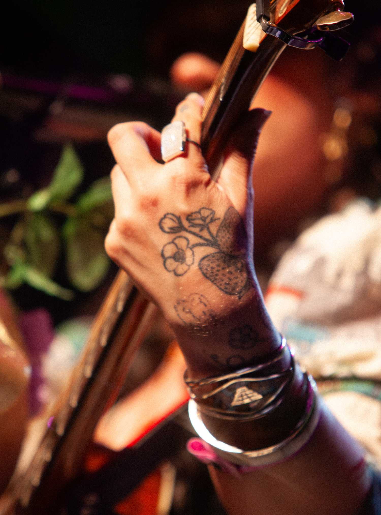 Sierra Ferrell tattoos: floral hand tattoo close-up