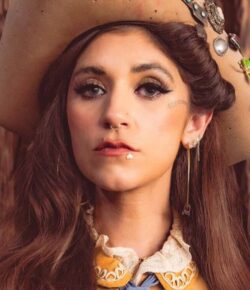 Sierra Ferrell Tattoos: Face Ink, Floral Hands and Americana Style