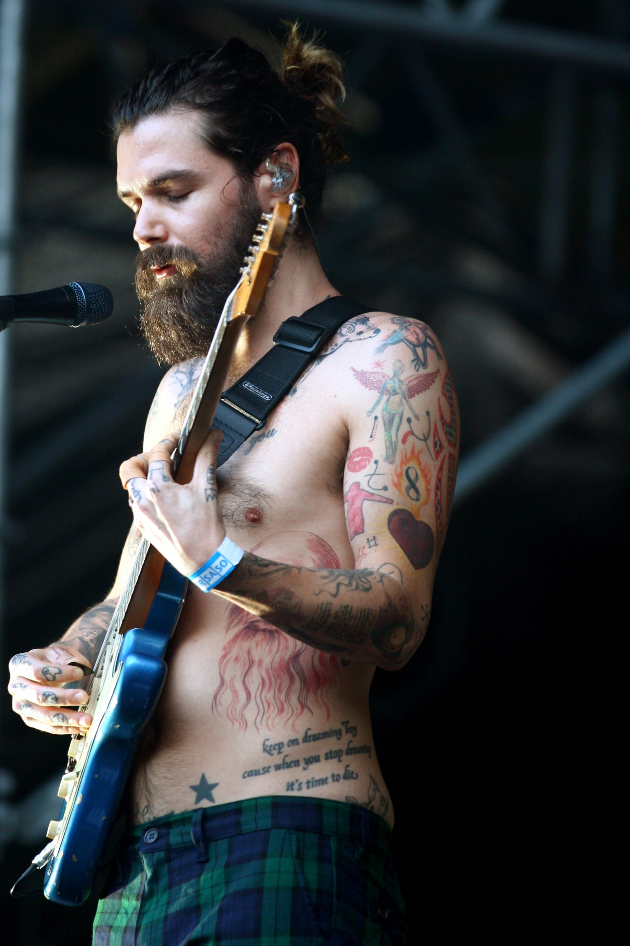 Simon Neil festival tattoos
