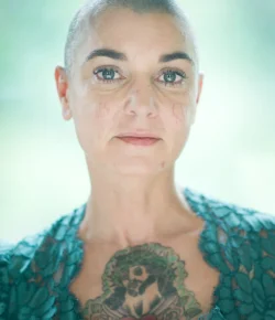 Sinéad O’Connor Tattoos: Face, Chest and Arm Ink Explained