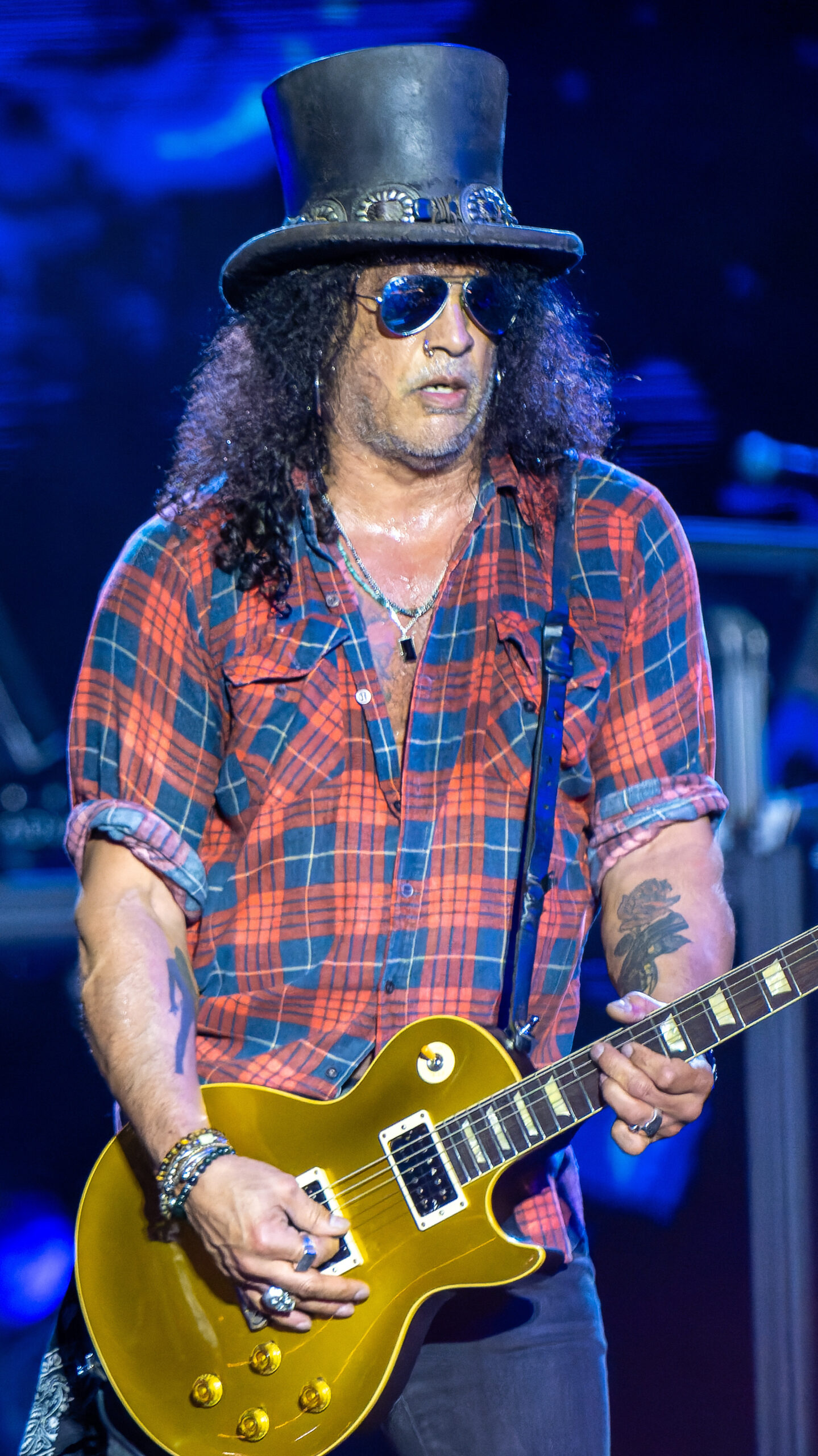 Slash forearm tattoos at Glastonbury