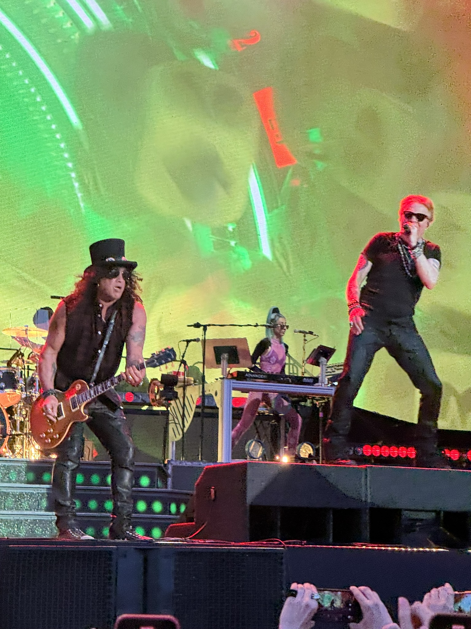 Slash upper arm tattoo at a Guns N’ Roses show