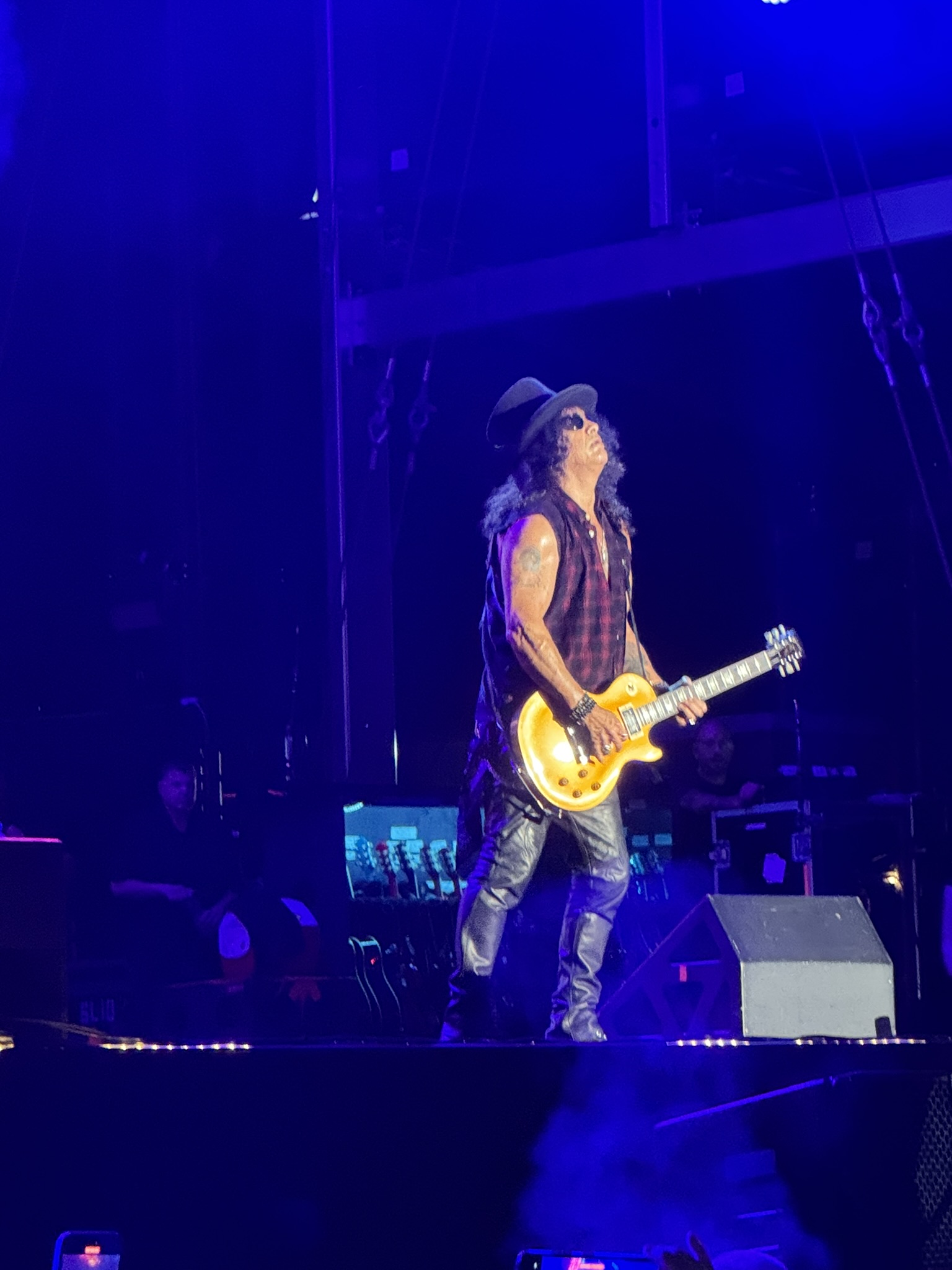 Slash exposed arm tattoo at a Guns N’ Roses show