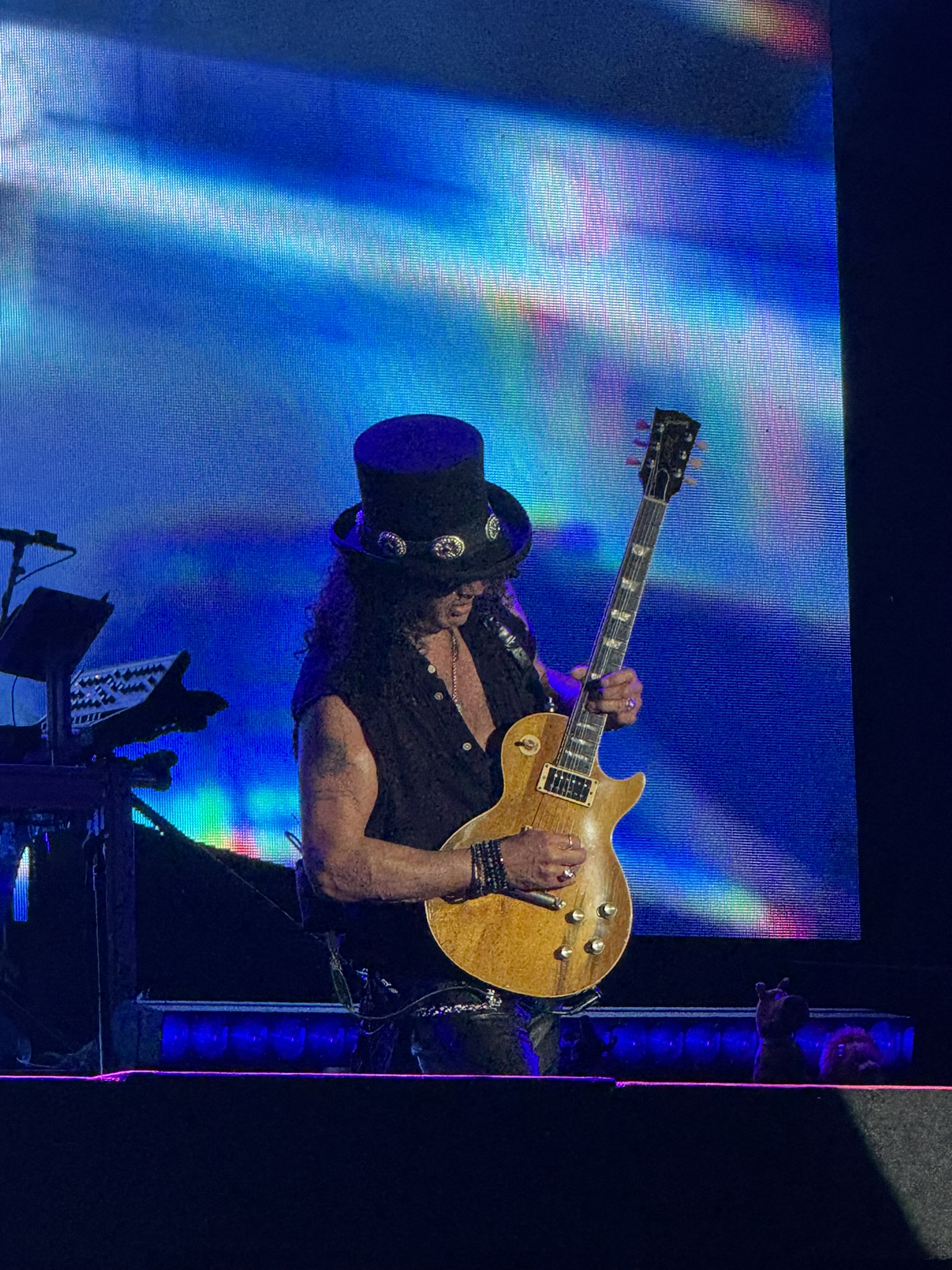 Slash shoulder tattoo at a Guns N’ Roses show