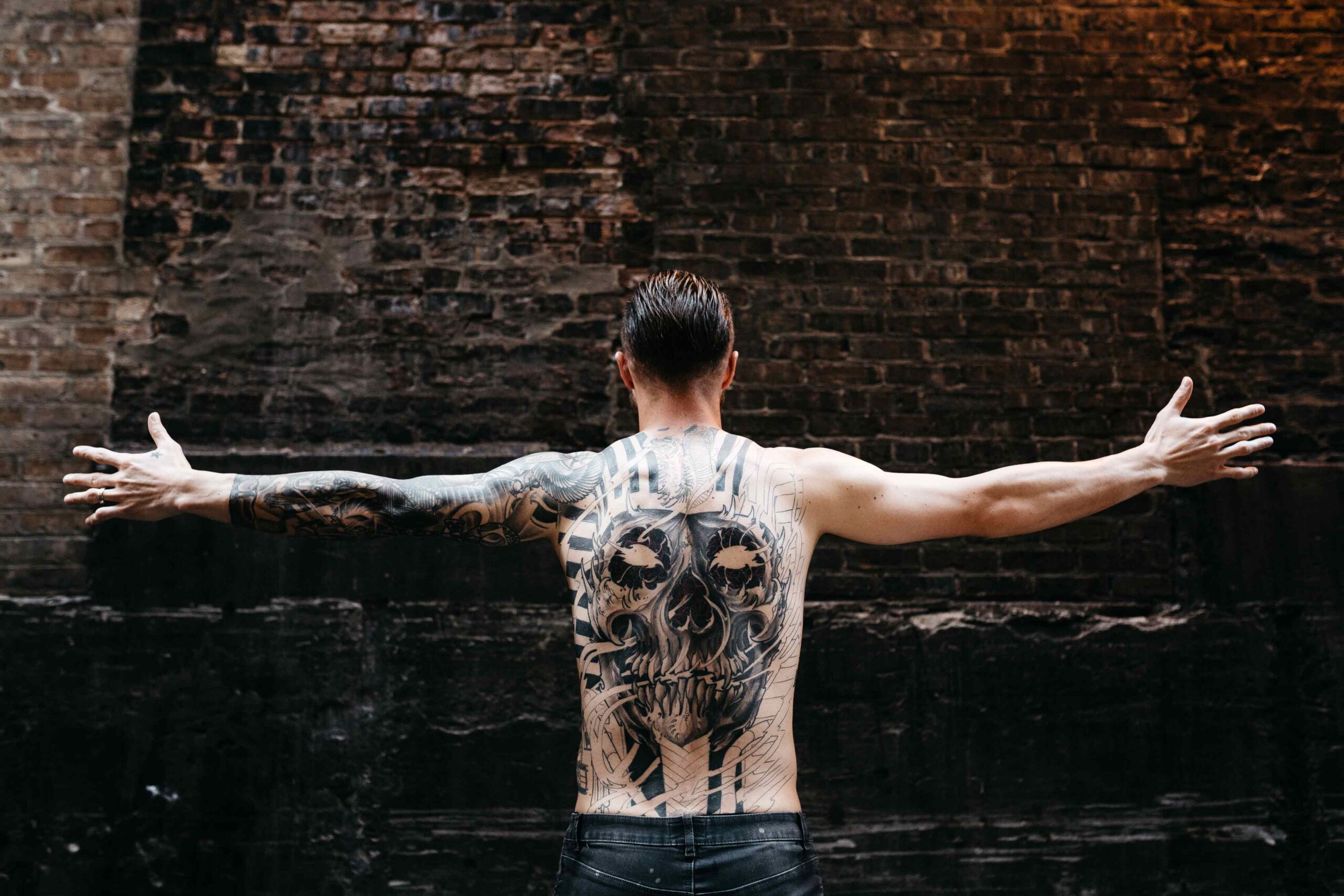 Stefan Frei tattoos: second distinct view of the Egyptian skull back piece with arms outstretched