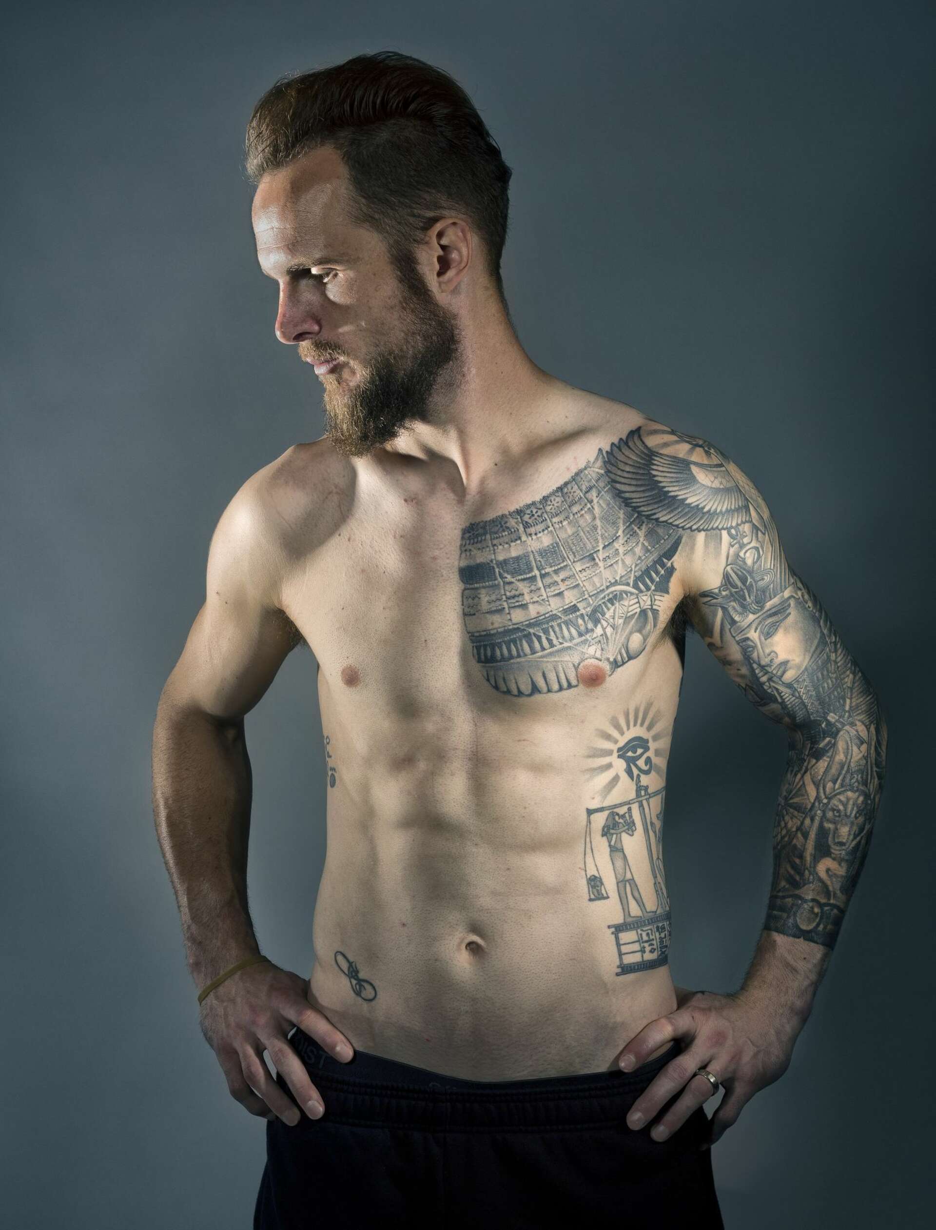 Stefan Frei tattoos: Egyptian chest and left-arm work in a front three-quarter studio portrait
