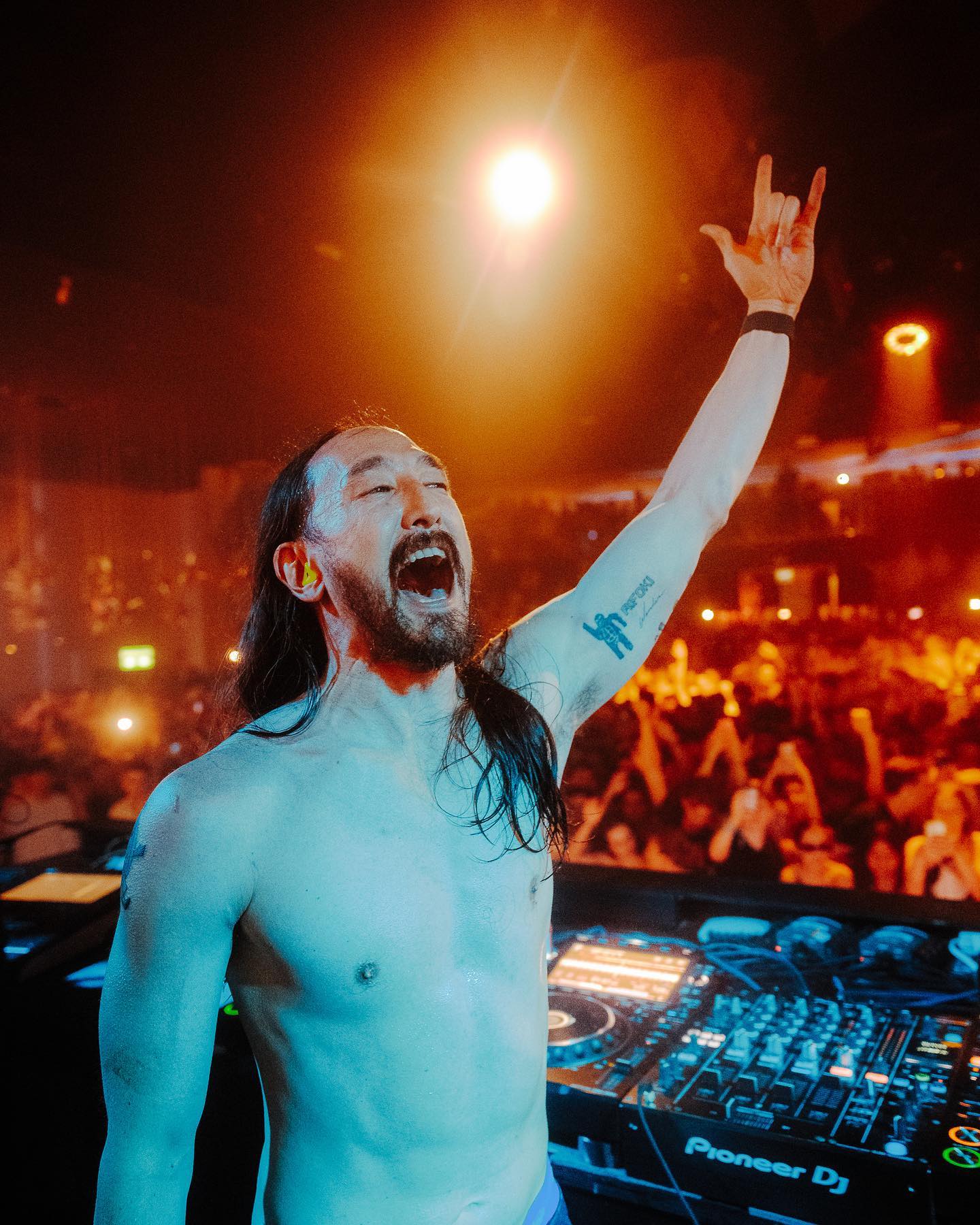 Steve Aoki Dim Mak and arm tattoos