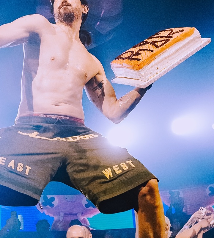 Steve Aoki upper arm tattoo detail