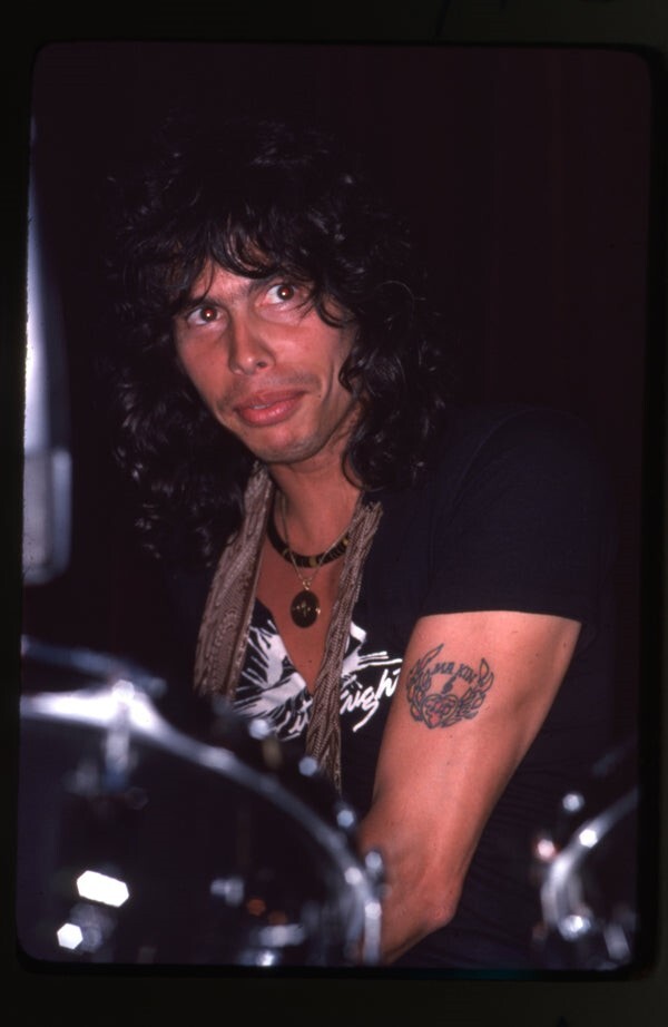 Close view of Steven Tyler’s Ma Kin winged-heart tattoo