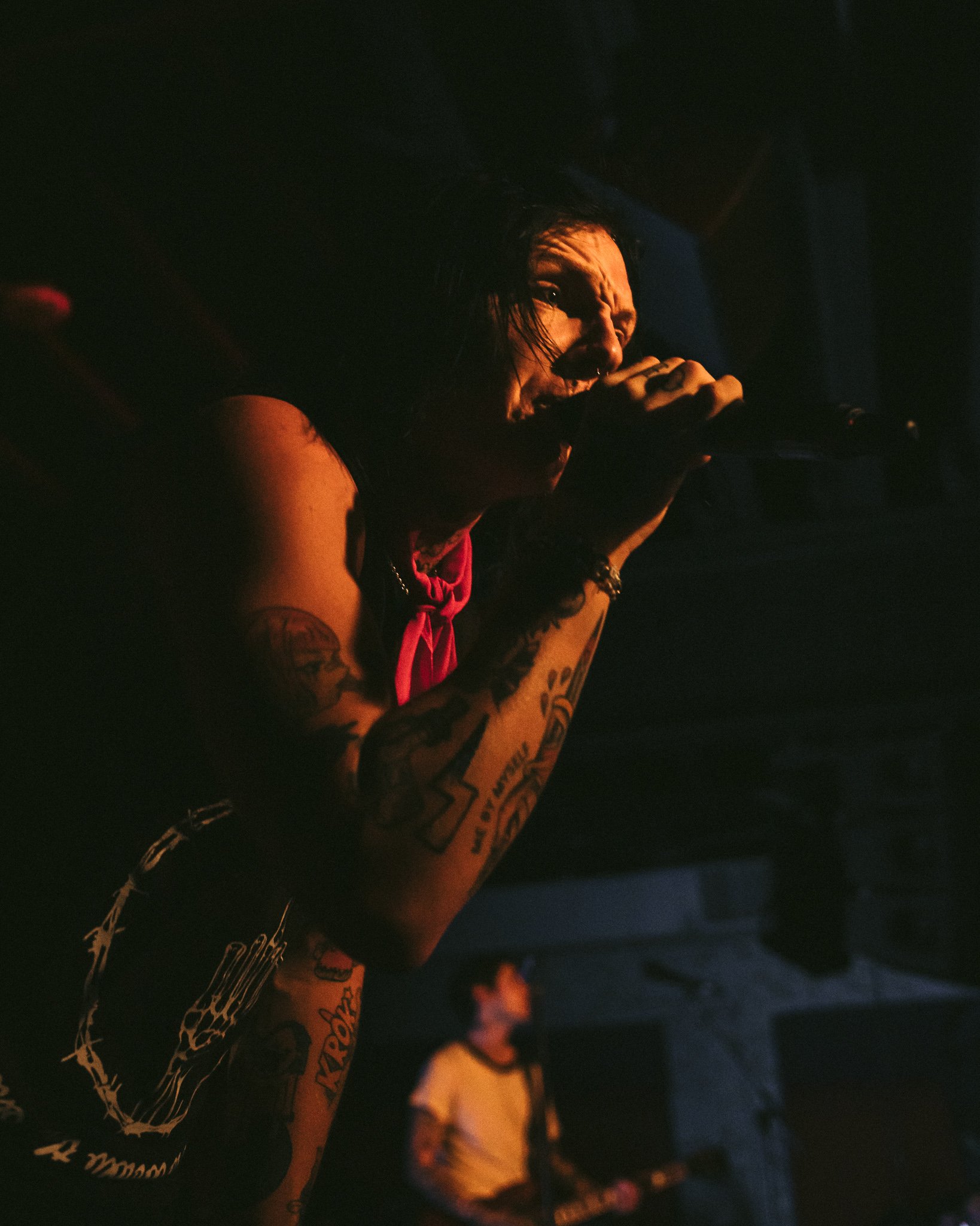 Sueco forearm tattoos during a live show