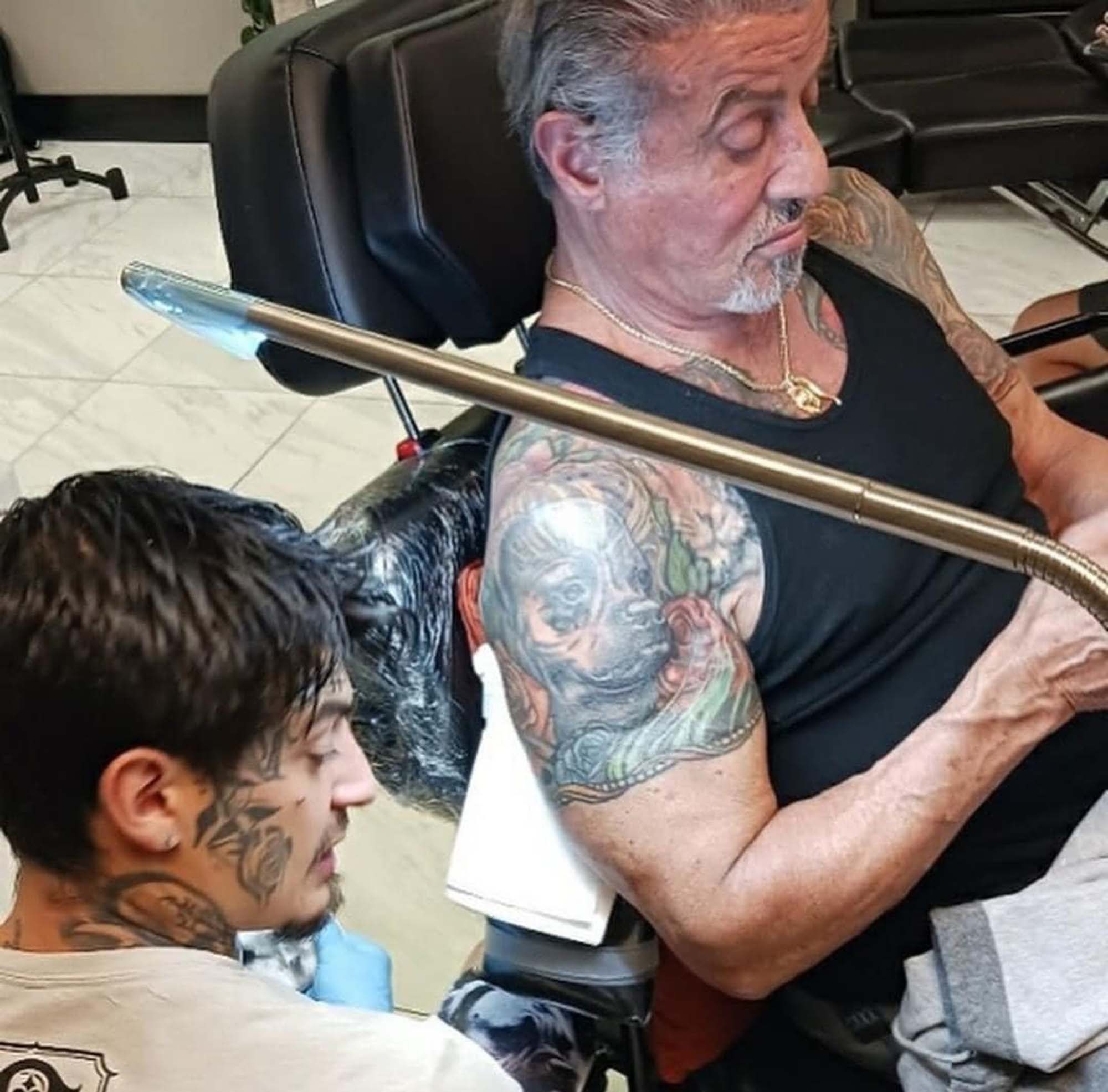 Sylvester Stallone leopard cover-up tattoo