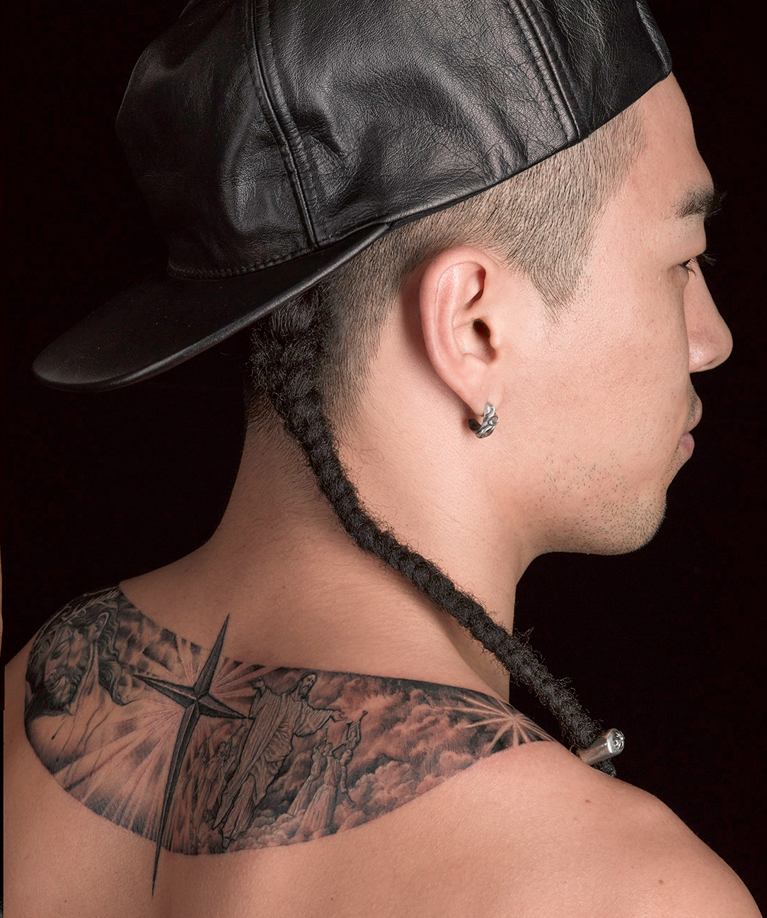 Taeyang tattoos: larger back and shoulder tattoo