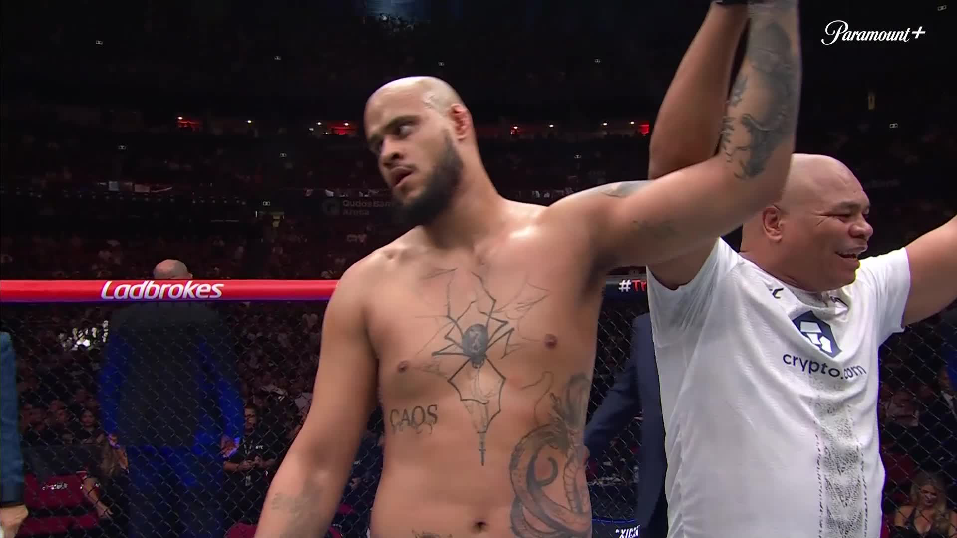 Tai Tuivasa tattoos: chest spider, CAOS lettering, and torso ink