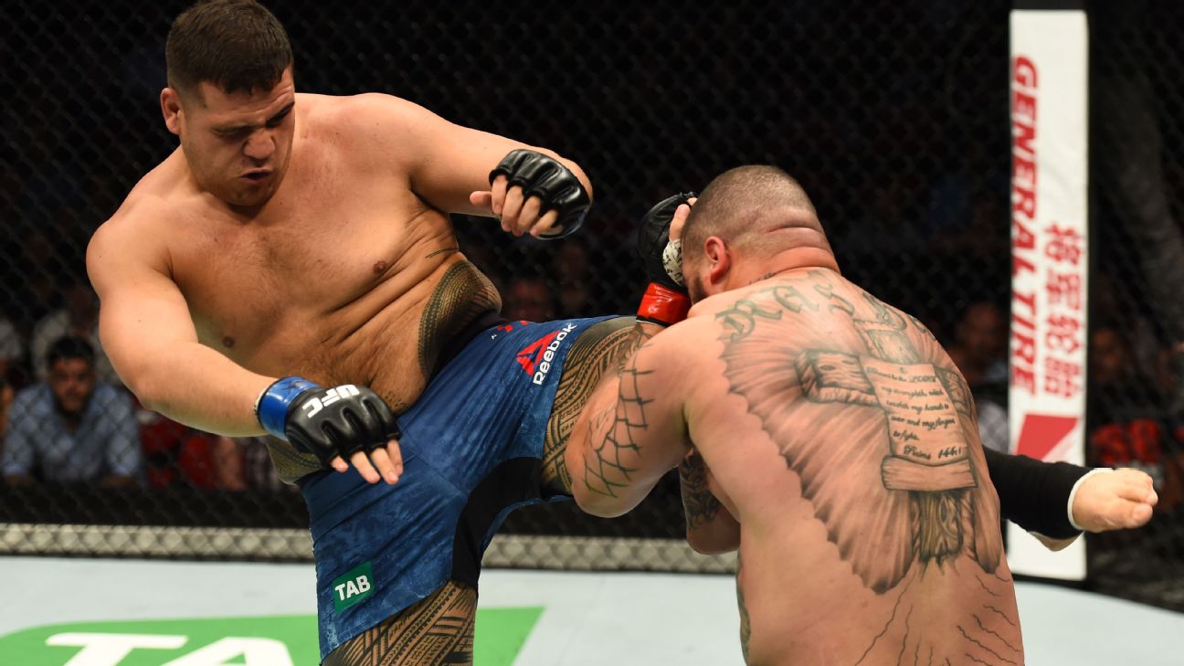Tai Tuivasa tattoos: upper-thigh bands during a fight