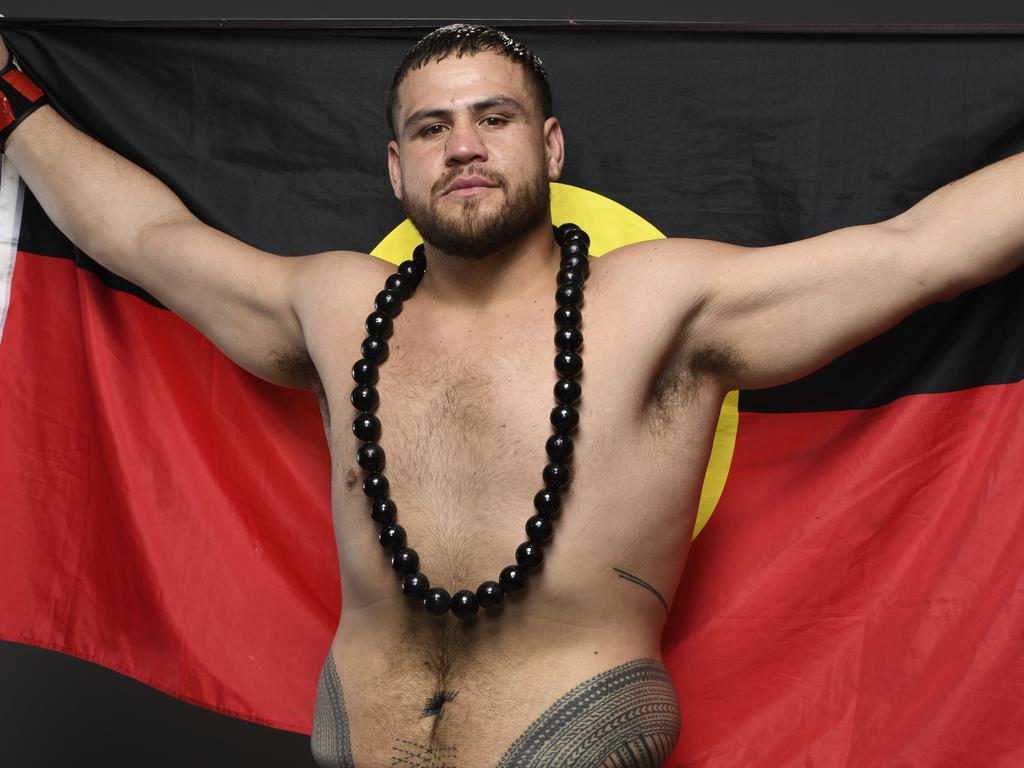 Tai Tuivasa tattoos: front waist and stomach view