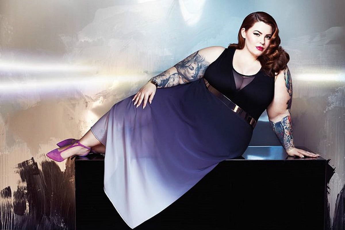 Tess Holliday Seated fashion photograph with the documented sleeve portraits visible on her arm Tess Holliday tattoos: Seated fashion photograph with the documented sleeve portraits visible on her arm
