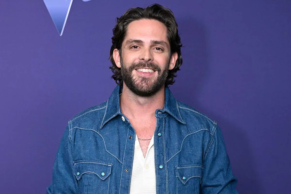 Thomas Rhett in a contextual photograph: contextual photo; not tattoo evidence; not tattoo evidence