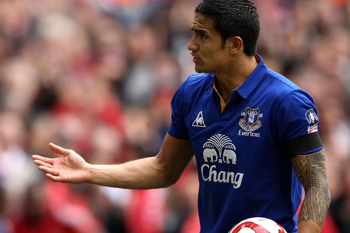 Tim Cahill Distinct Everton match photograph where the full tattooed arm is exposed and clearly visible Tim Cahill tattoos: Distinct Everton match photograph where the full tattooed arm is exposed and clearly visible