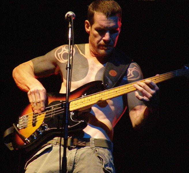 Tim Commerford arm and shoulder tattoos