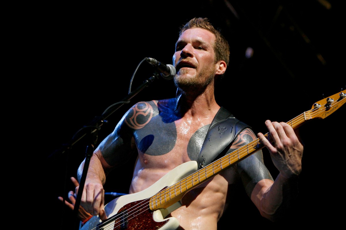 Tim Commerford blackwork chest tattoos