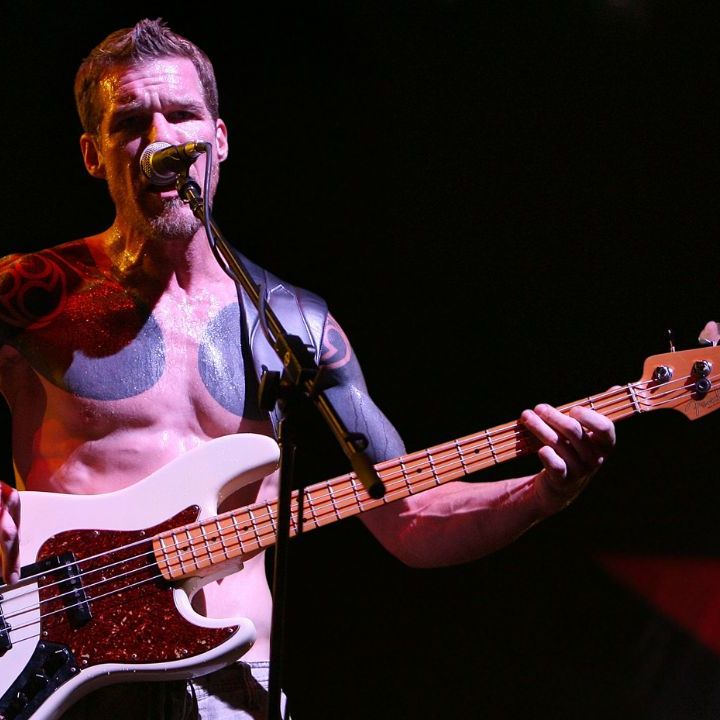 Tim Commerford stage chest tattoos