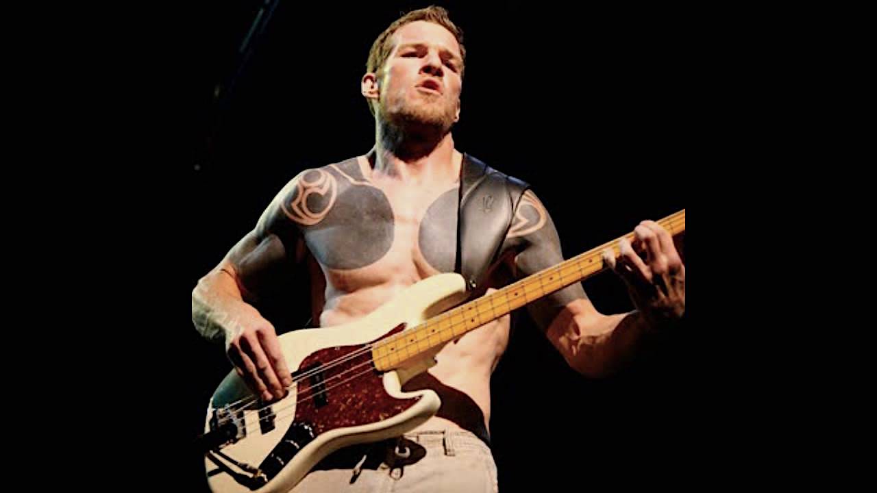 Tim Commerford tribal chest tattoos