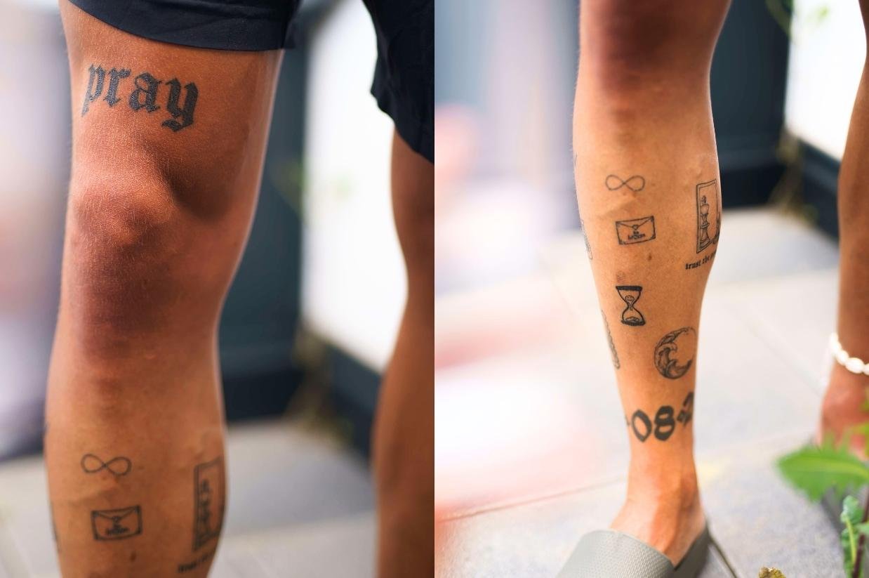 Tim Kühnel tattoos: Back photograph documenting the large central cross described by Kühnel