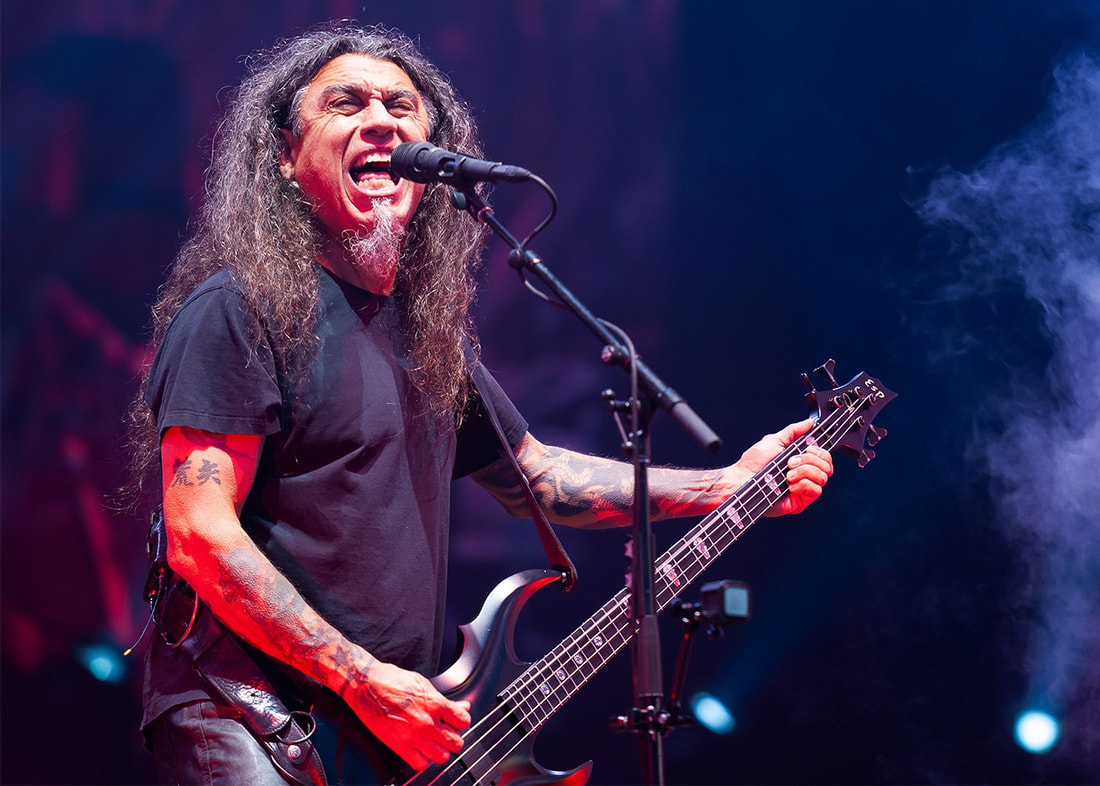 Tom Araya tattooed forearms during Slayer performance at Download 2019