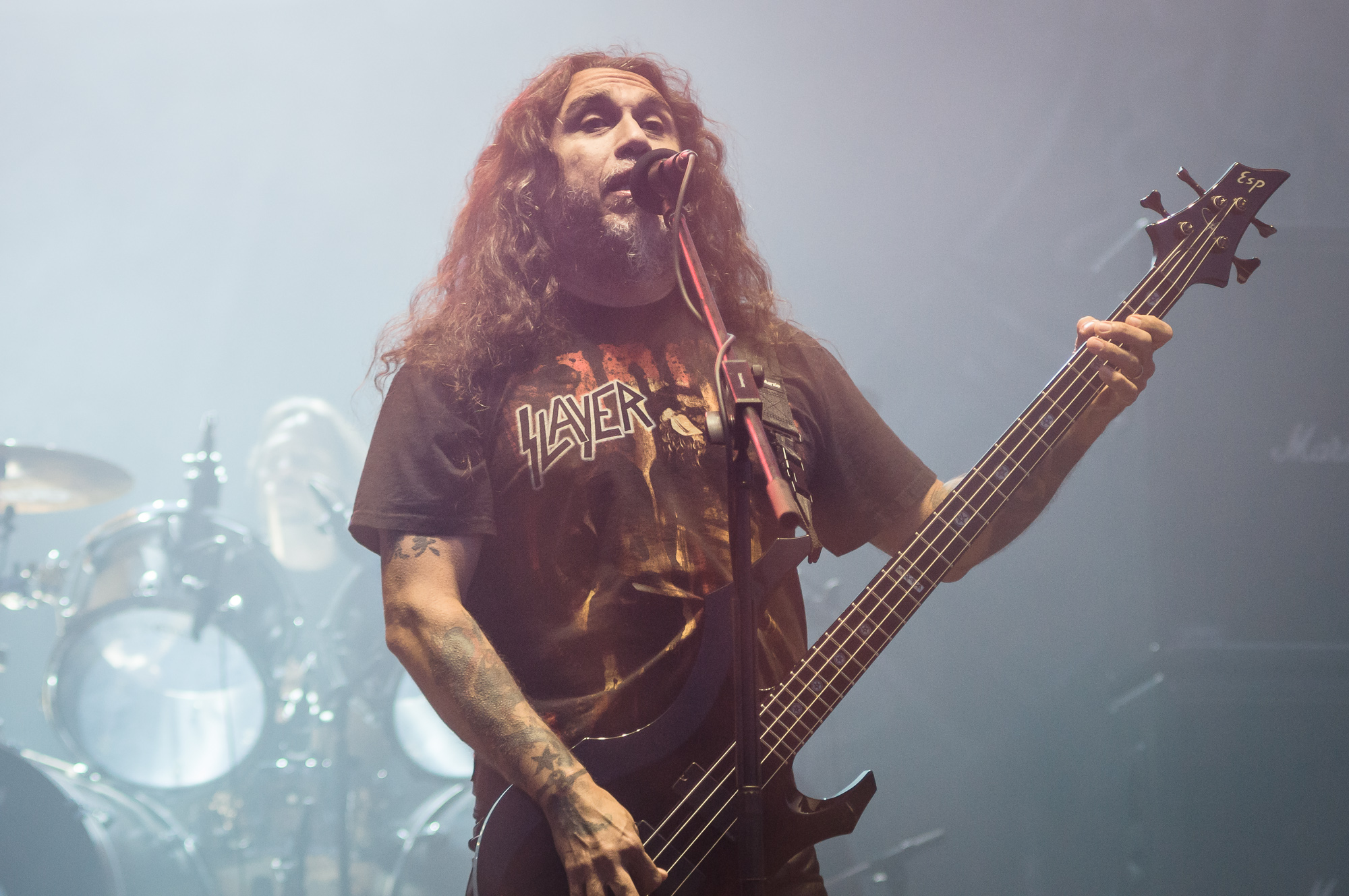 Tom Araya tattooed forearms during Slayer performance at Ursynalia 2012