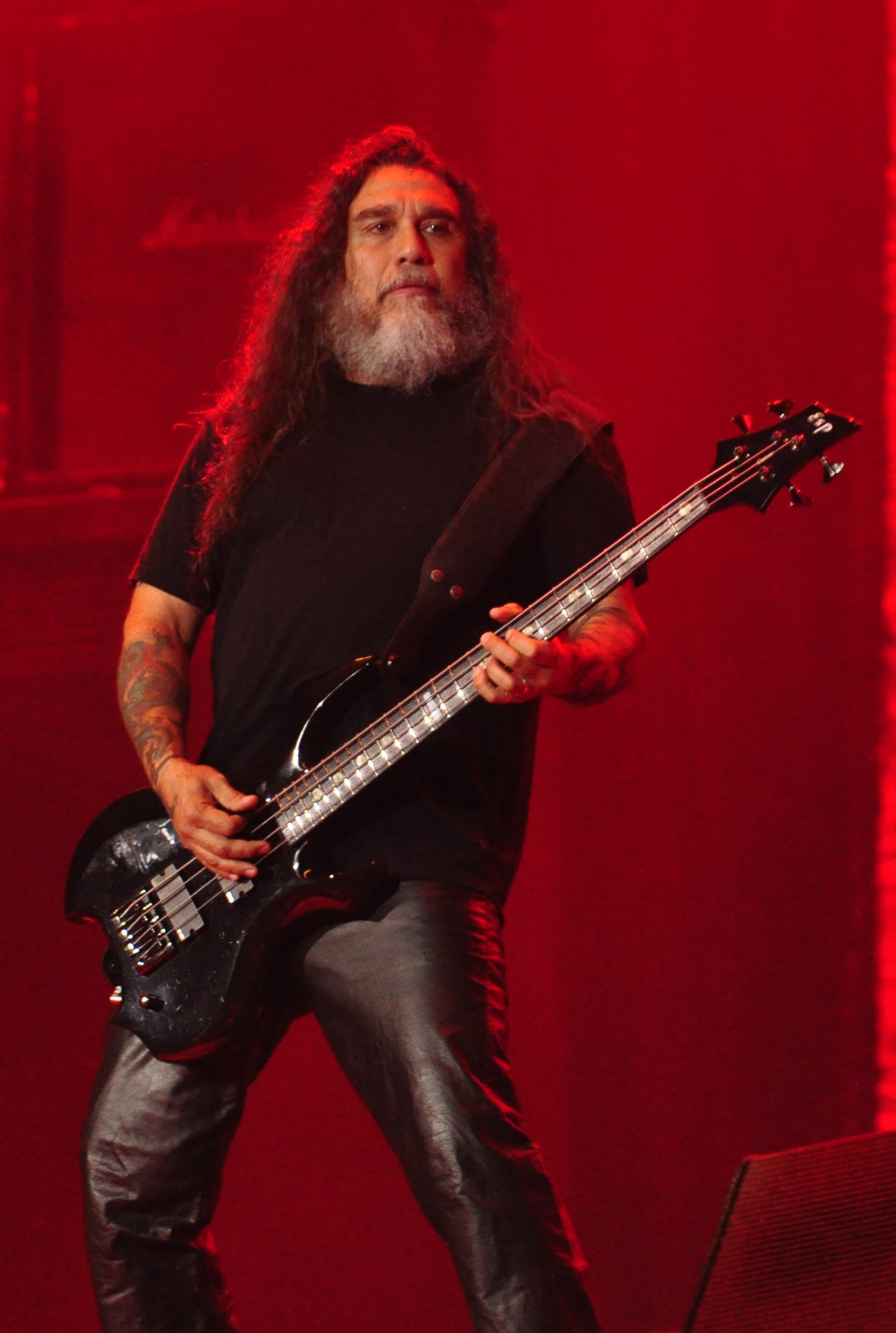 Tom Araya tattooed arms during Slayer performance at Wacken 2014