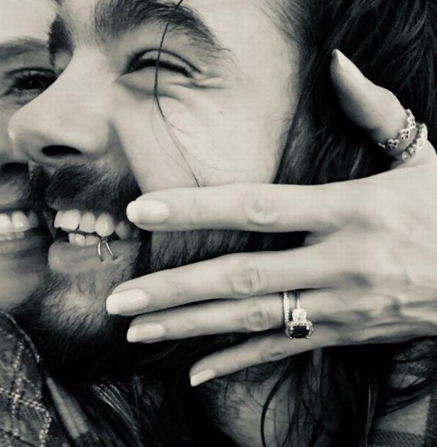 Tom Kaulitz couple-photo context Tom Kaulitz in a contextual photograph: older couple-photo context only; not tattoo evidence