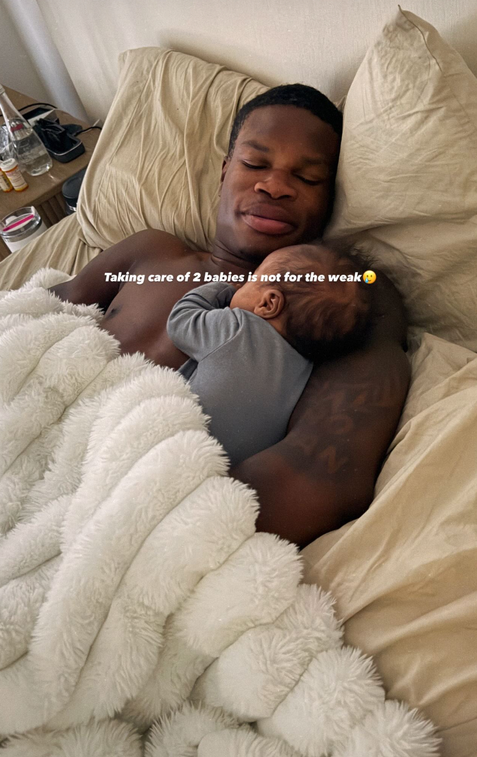 Travis Hunter in a contextual photograph: Contextual family photograph; explicitly not tattoo evidence.; not tattoo evidence
