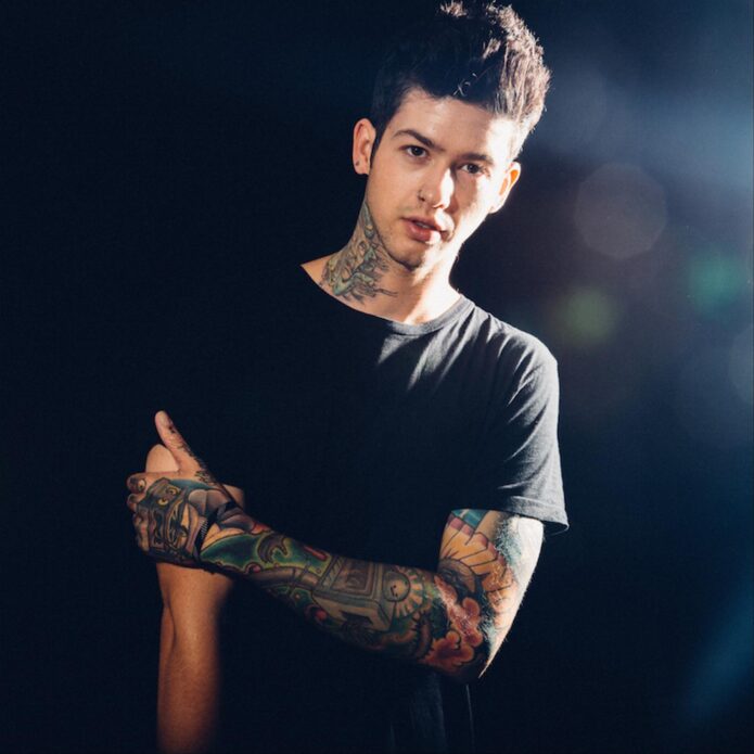 Travis Mills tattoos