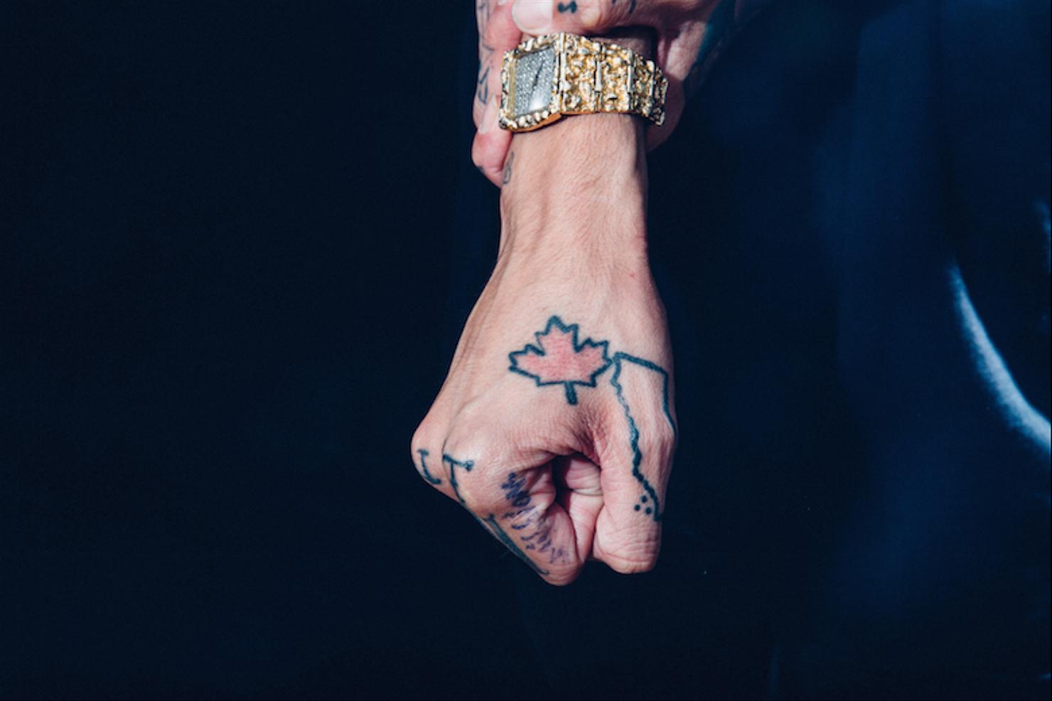 Travis Mills colorful robot and cassette sleeve tattoo