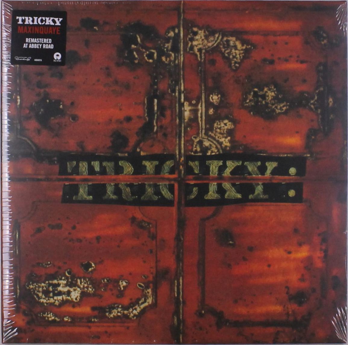 Tricky in a contextual photograph: contextual_only; not tattoo evidence