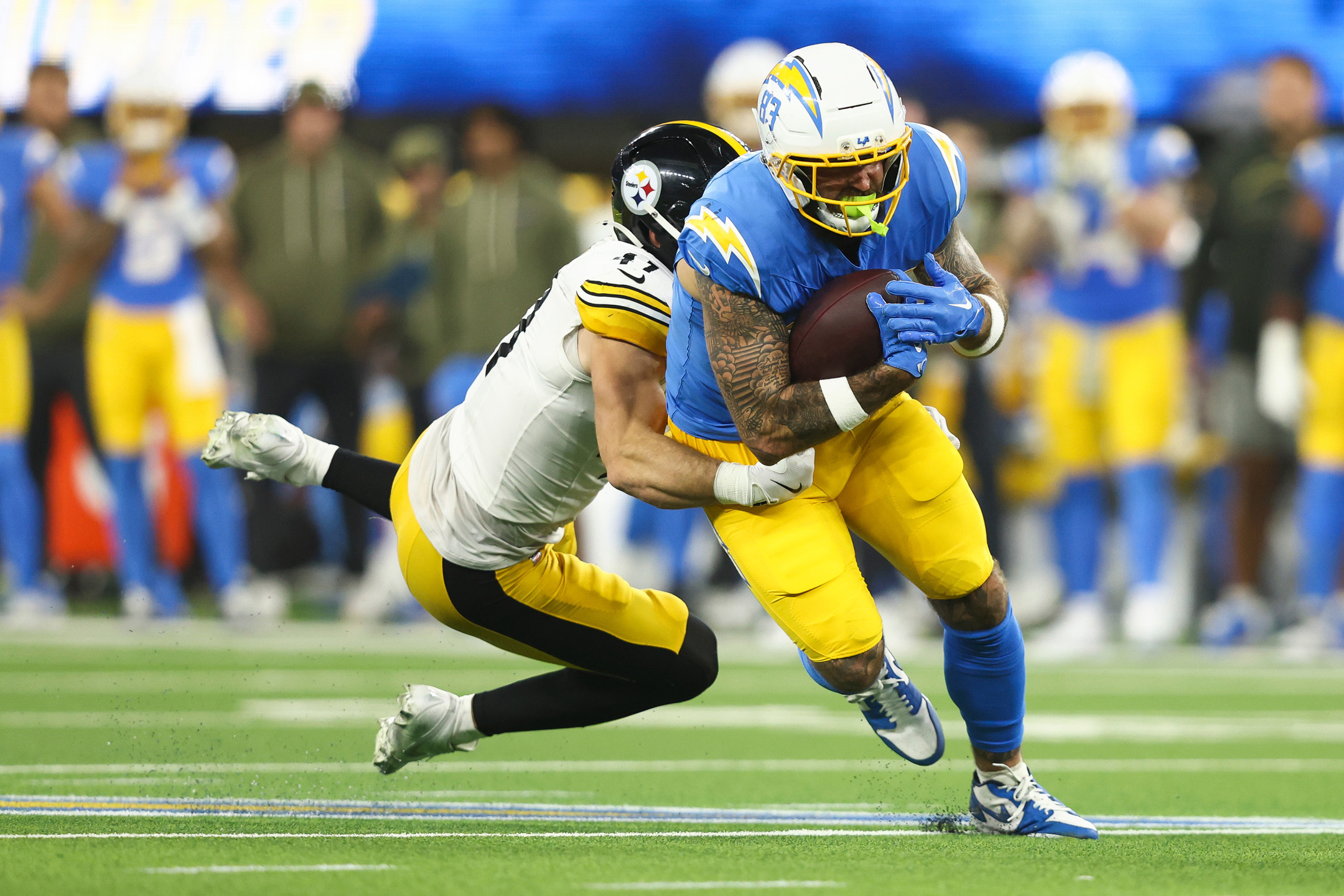Tyler Conklin Lower-arm script and blackwork details in a native-resolution official Detroit Lions photograph Tyler Conklin tattoos: Lower-arm script and blackwork details in a native-resolution official Detroit Lions photograph