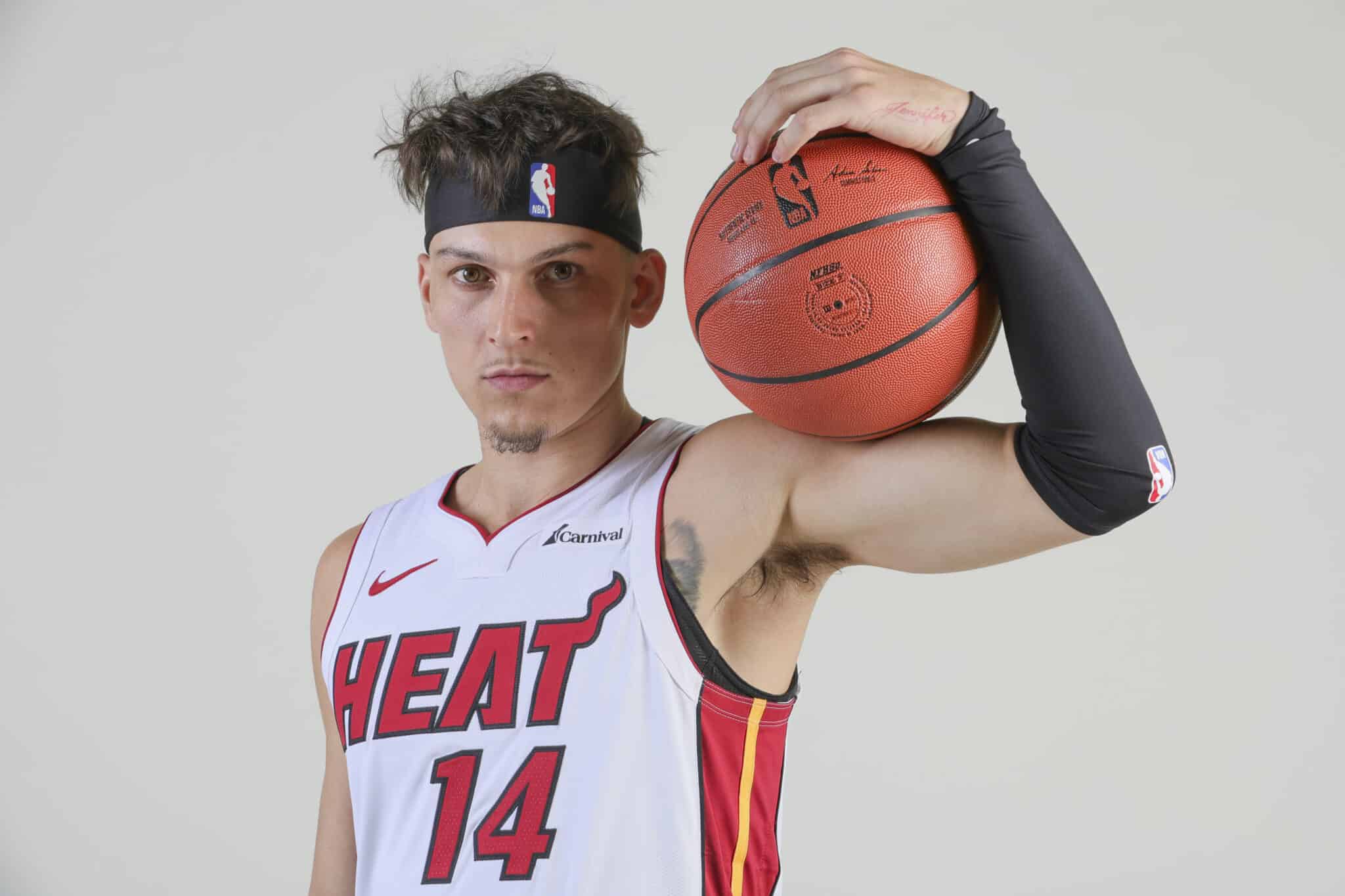 Tyler Herro in a contextual photograph: Contextual game portrait of Tyler Herro; not tattoo evidence; not tattoo evidence