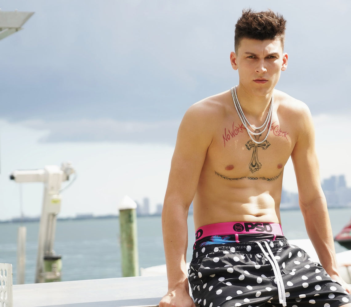 Tyler Herro tattoos: Tyler Herro's cross and 2000 chest design