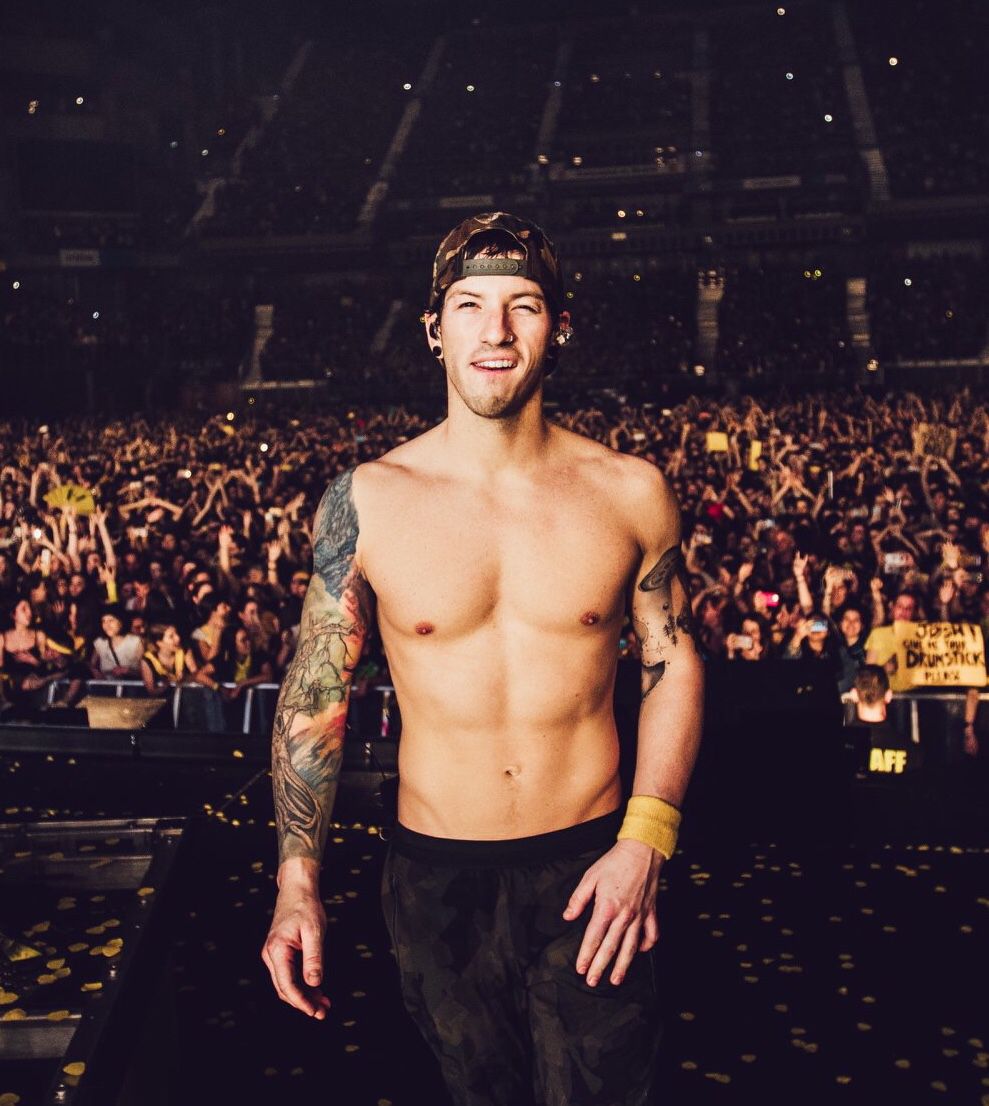 Tyler Joseph tattoos: solid arm band tattoos