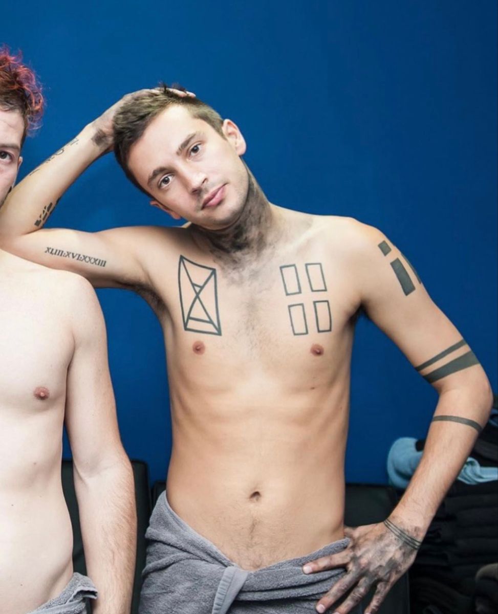 Tyler Joseph tattoos: chest rectangle and hourglass tattoos