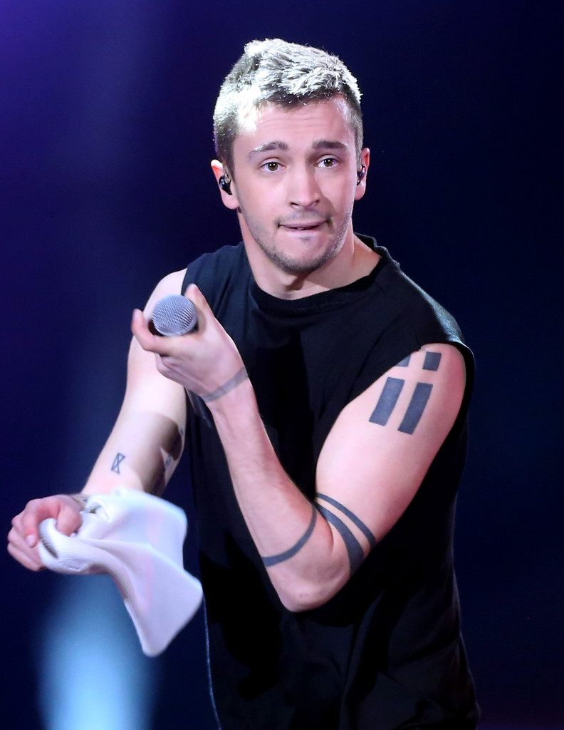 Tyler Joseph tattoos: Columbus C/X bicep tattoo