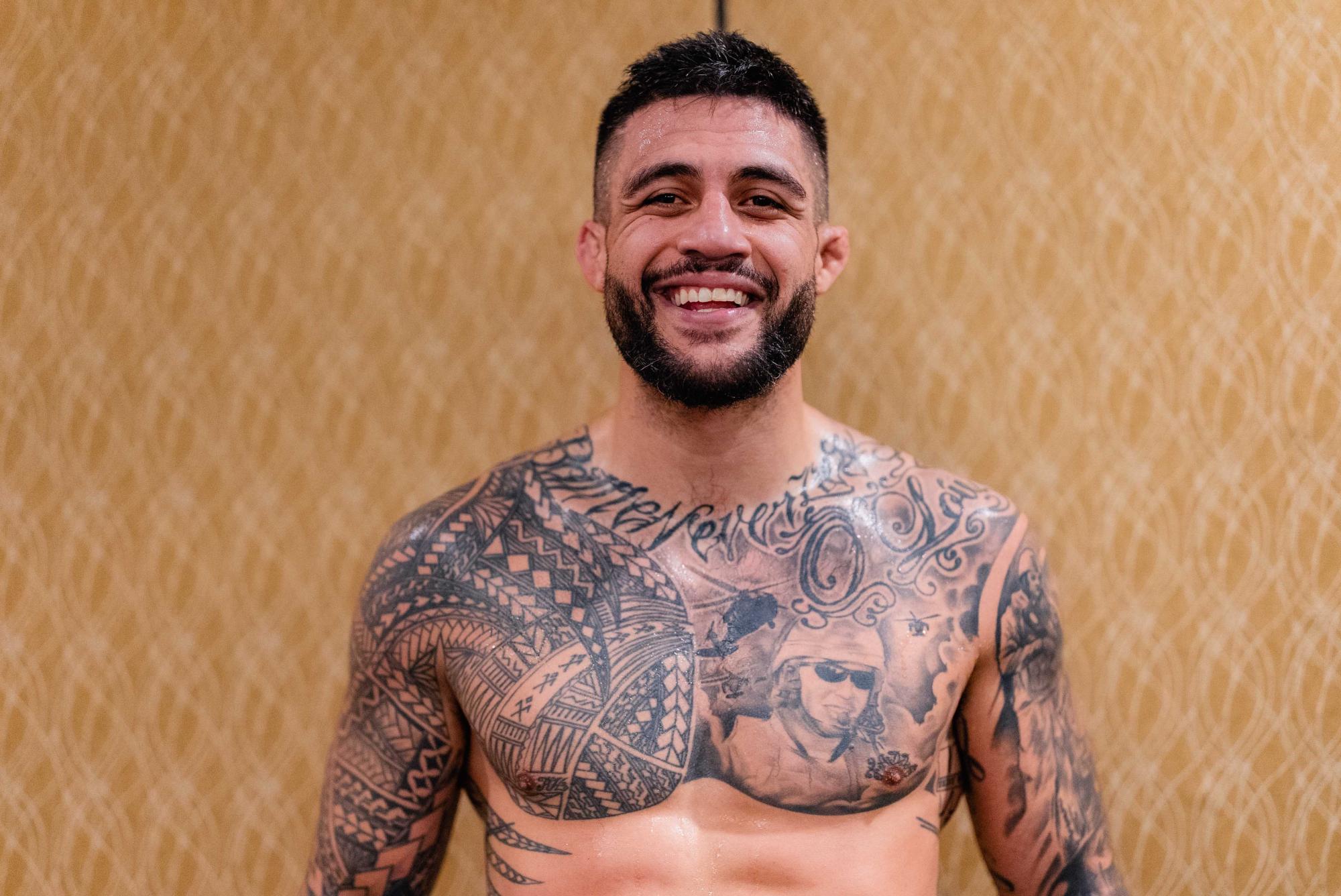 Tyson Pedro tattoos: Training portrait showing Pedro’s central chest portrait, family-related script and surrounding geometric work.