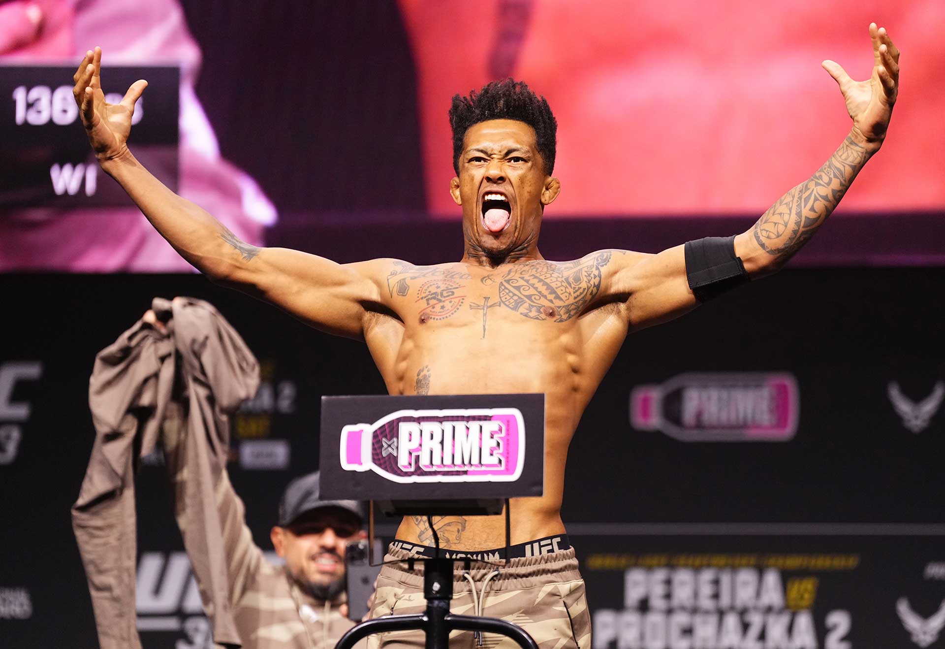 Vinicius Oliveira tattoos: Força and Honra across the chest