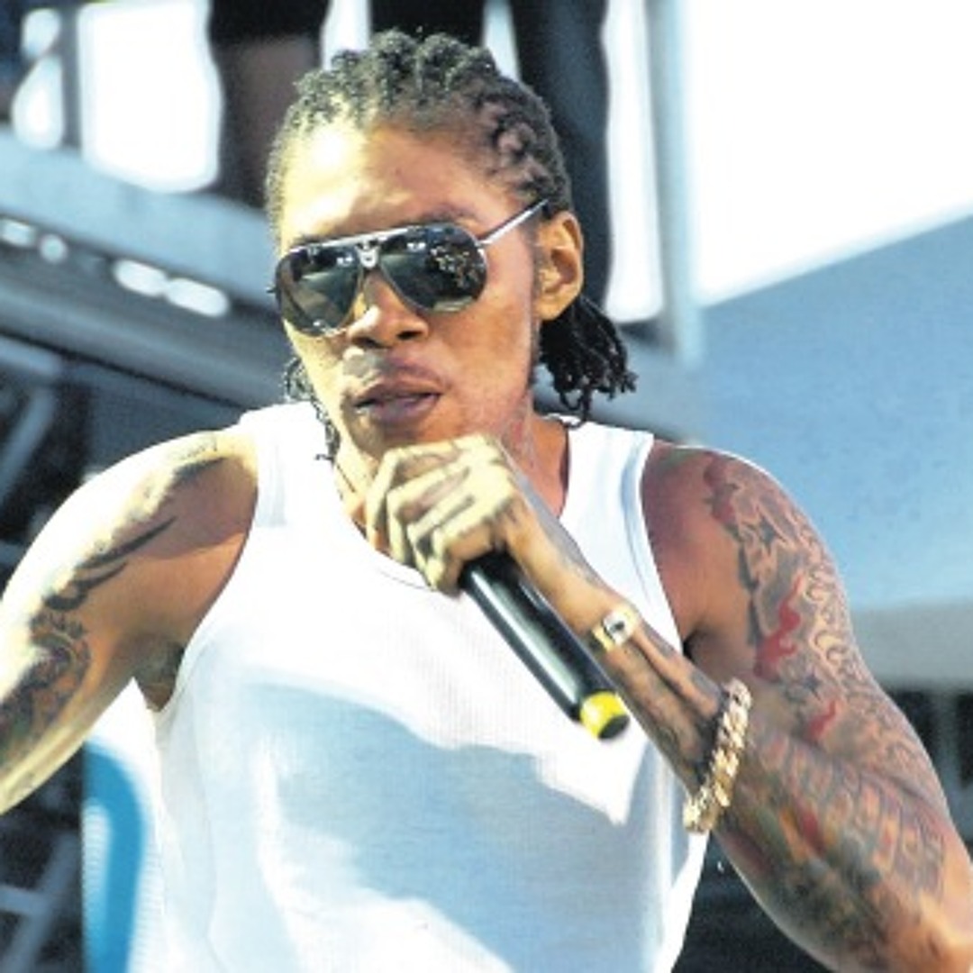 Vybz Kartel tattooed arms during performance